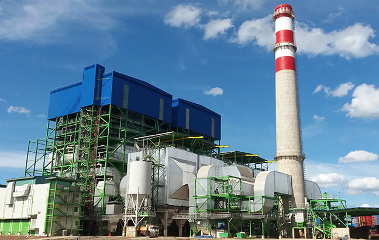 Blue electrostatic precipitator with ductwork and support framework.